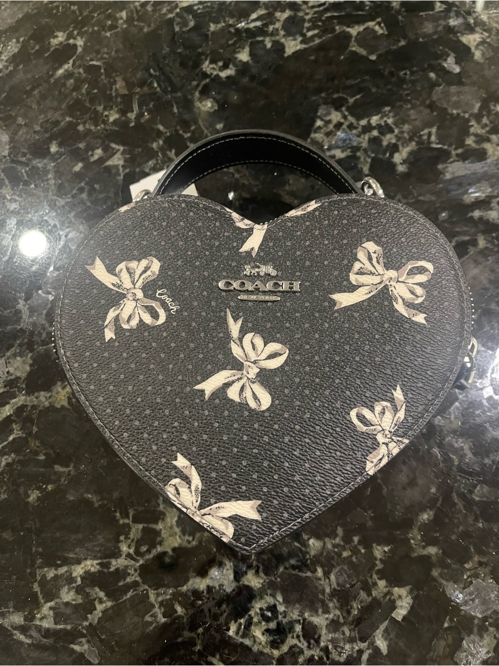 Coach Black Heart-Shaped Bag with White Bow Print